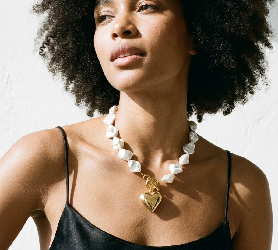Baroque natural pearls and heart pendant