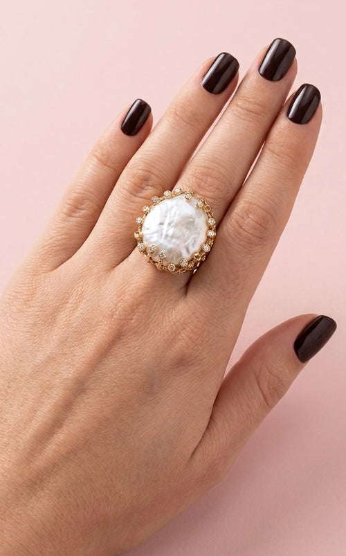 Anello con perla spessa e zirconi