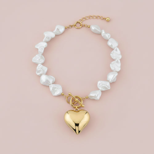 Baroque natural pearls and heart pendant