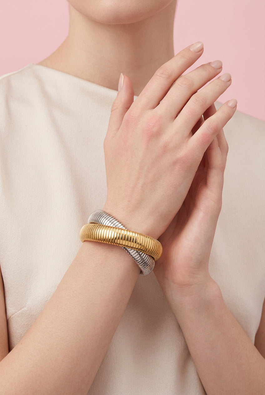 Set di bracciali a contrasto oro argento
