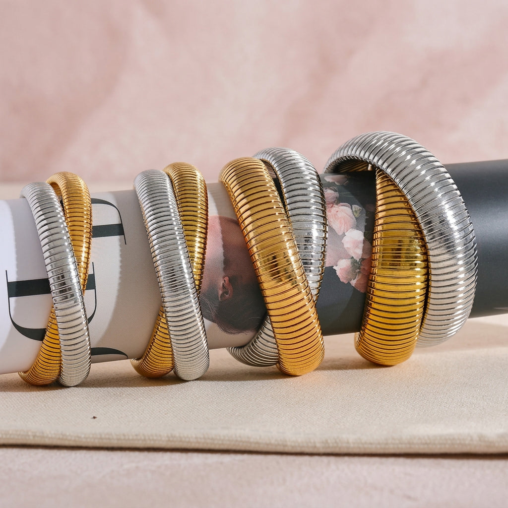 Set di bracciali a contrasto oro argento