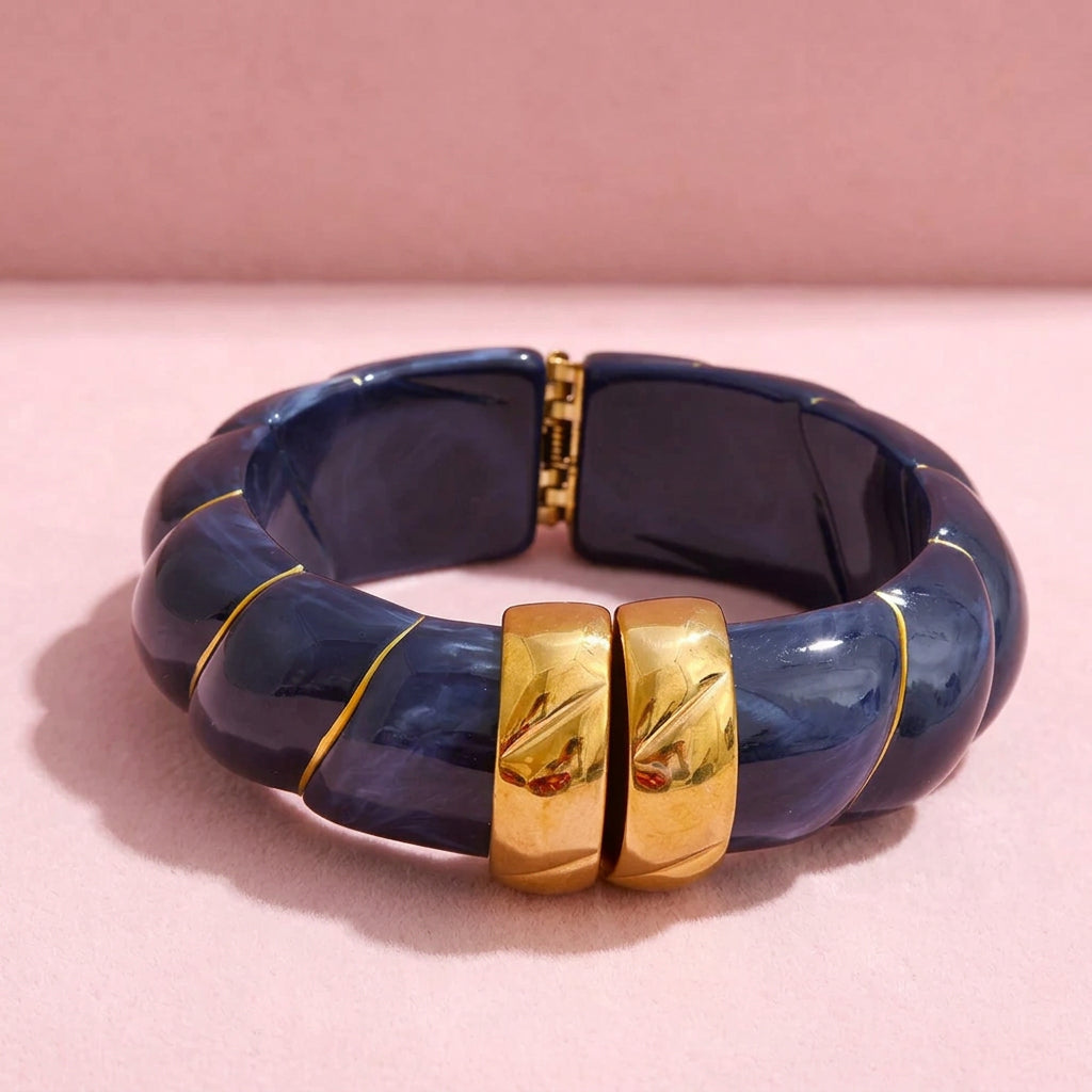Bracciale rigido a maglie grosse
