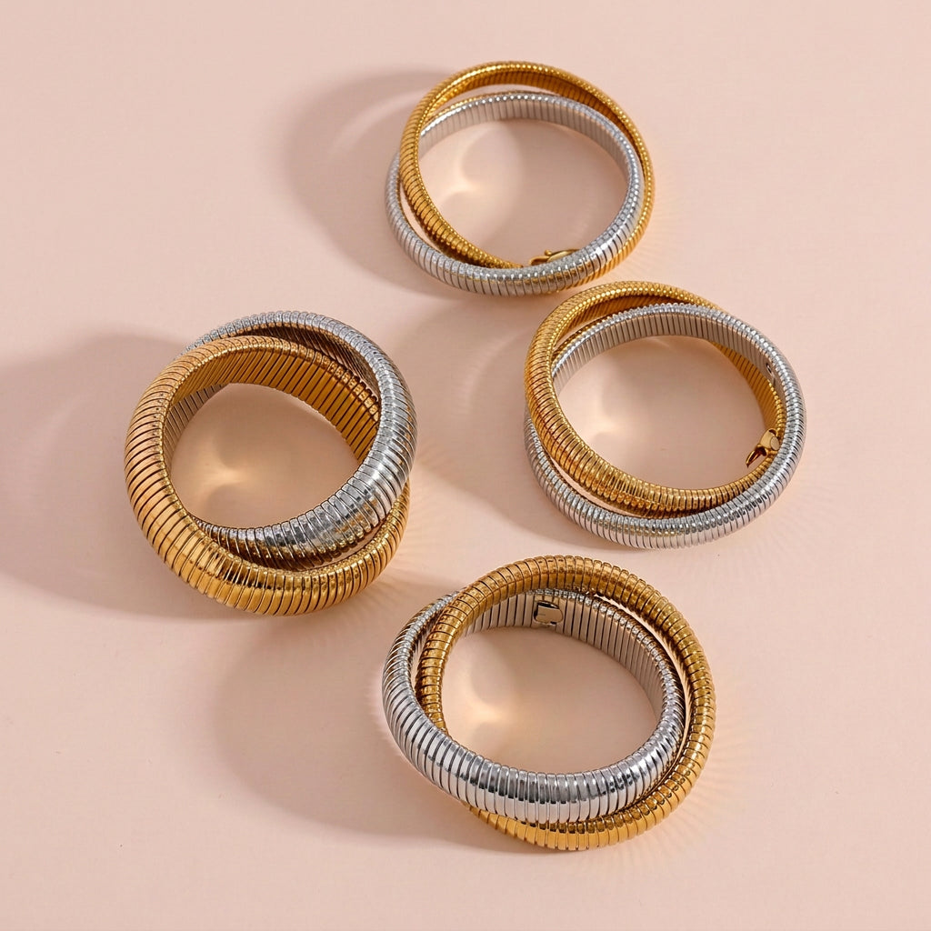 Set di bracciali a contrasto oro argento