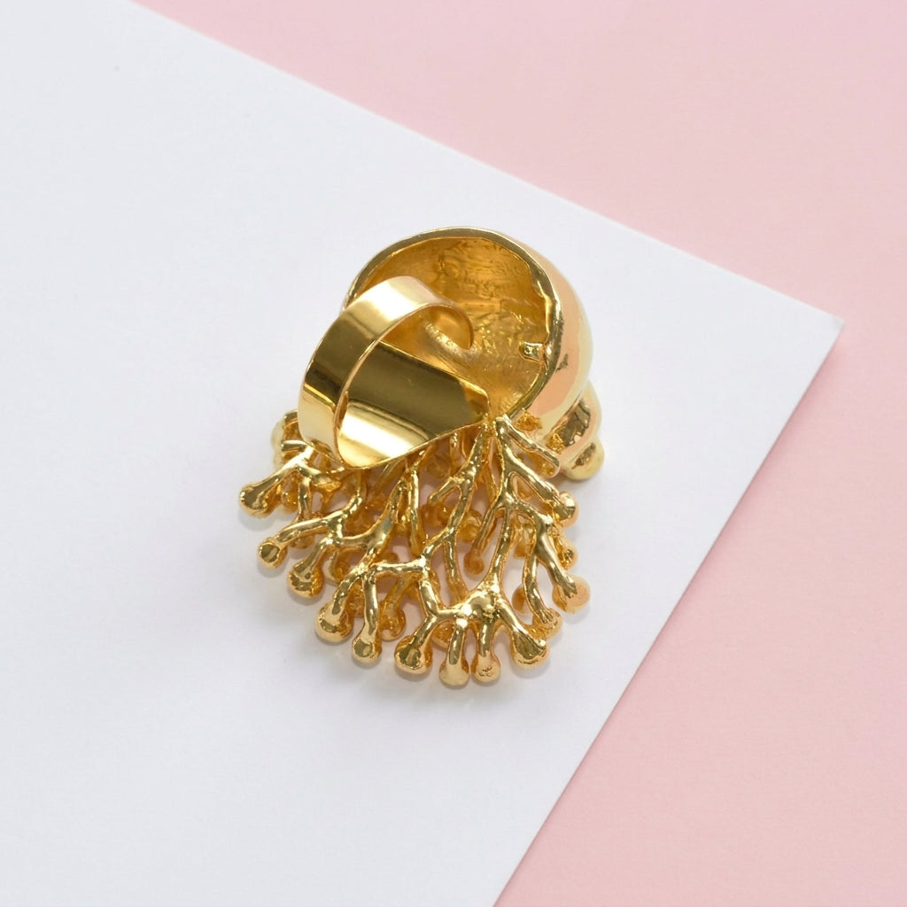Anello aperto a forma di lumaca di mare con strass