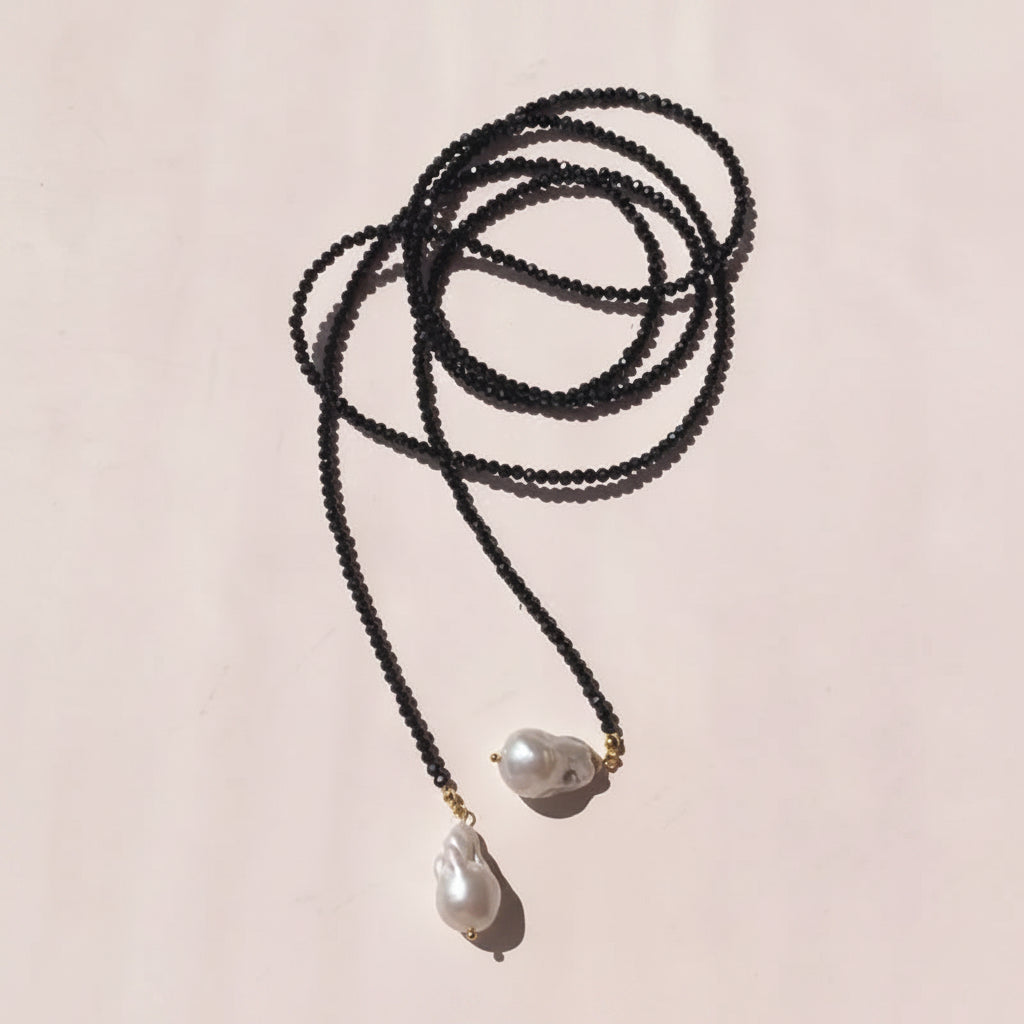 Crystal necklace with baroque pearl pendant
