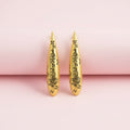 Engraved symbols long drop earrings