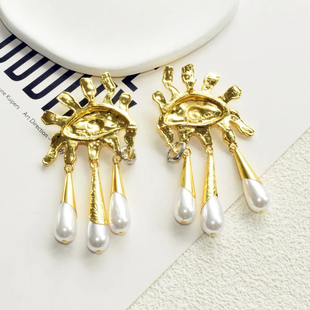 Sun Eye Dangle Pearl Earrings