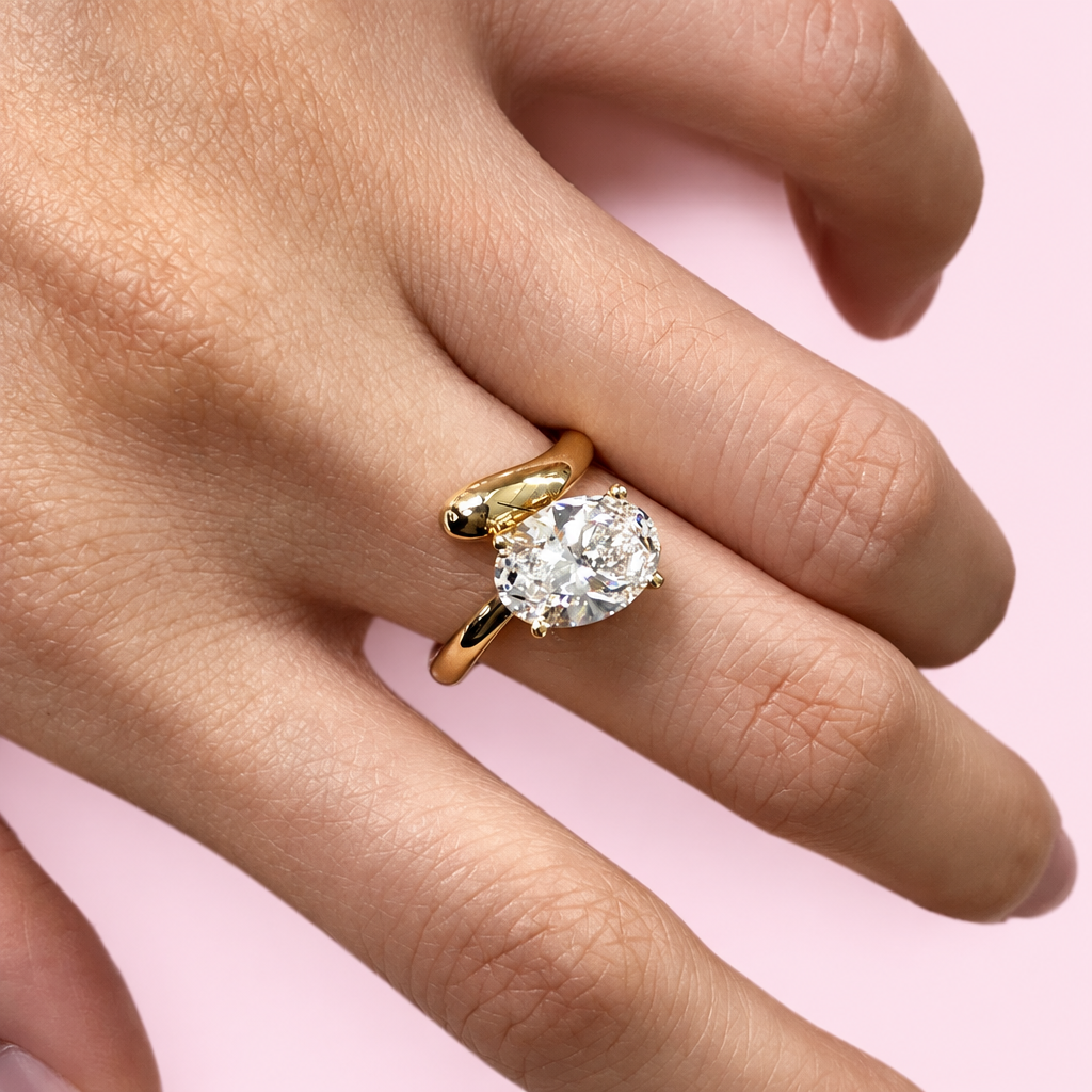 Exquisite Twist Zircon Rings with a light pink background