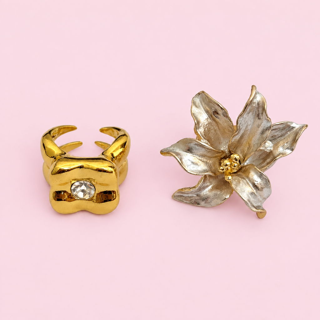 Surrealist ring on a light pink background