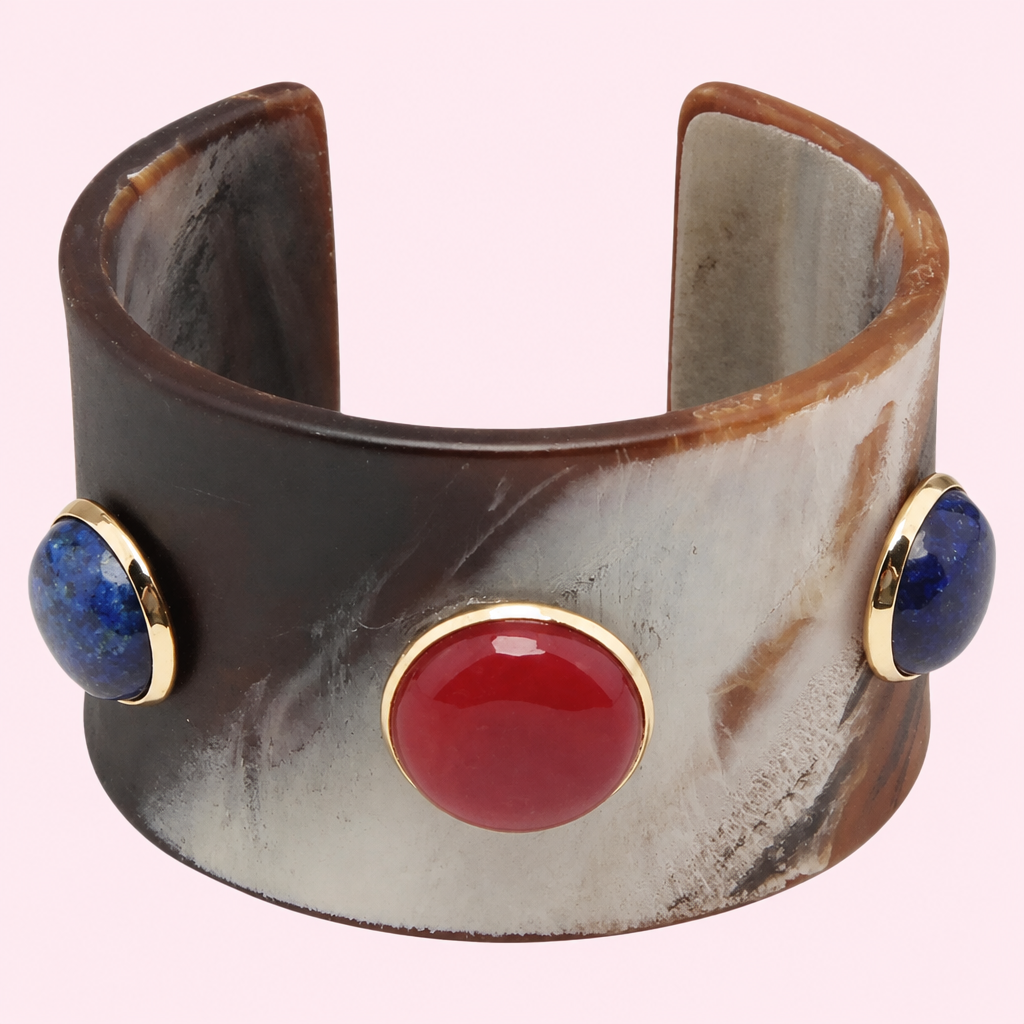 Natural Stone Wide Cuff Bracelet on a light pink background