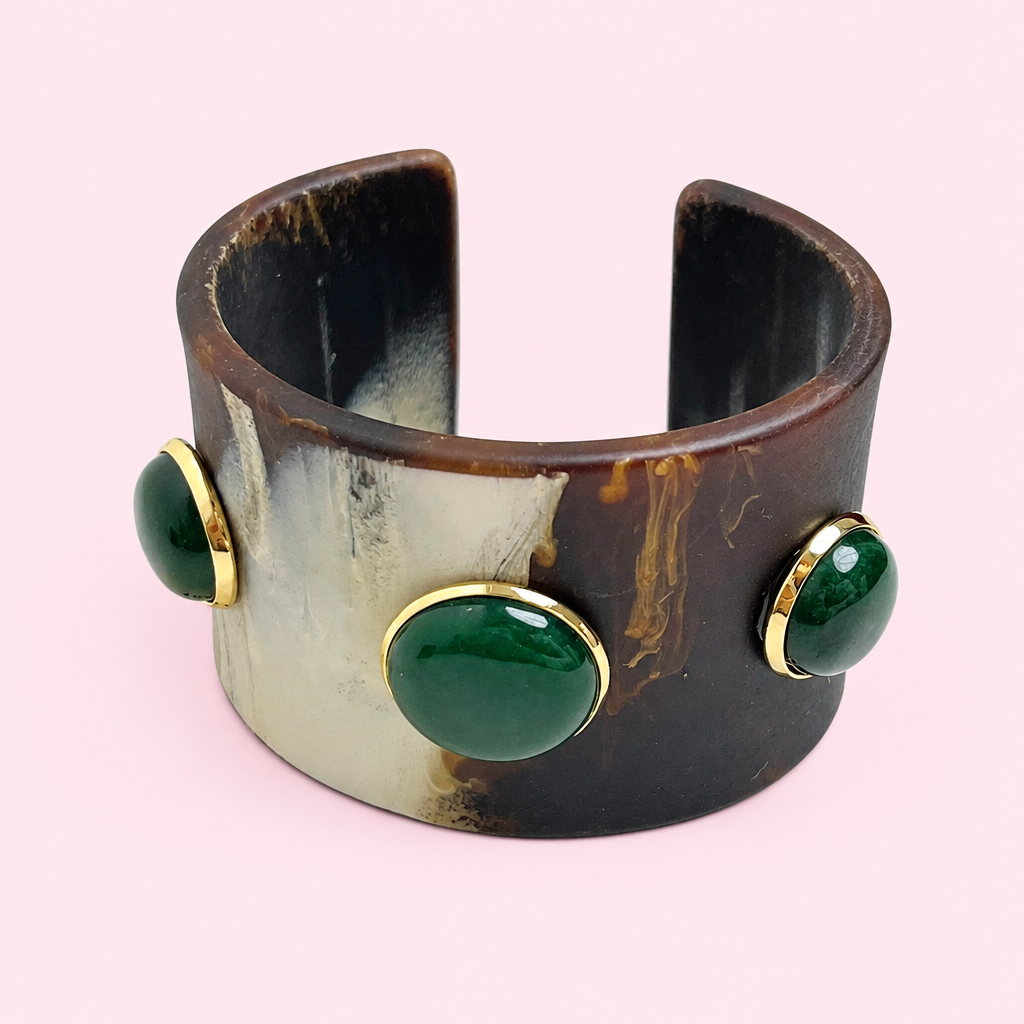 Natural Stone Wide Cuff Bracelet on a light pink background
