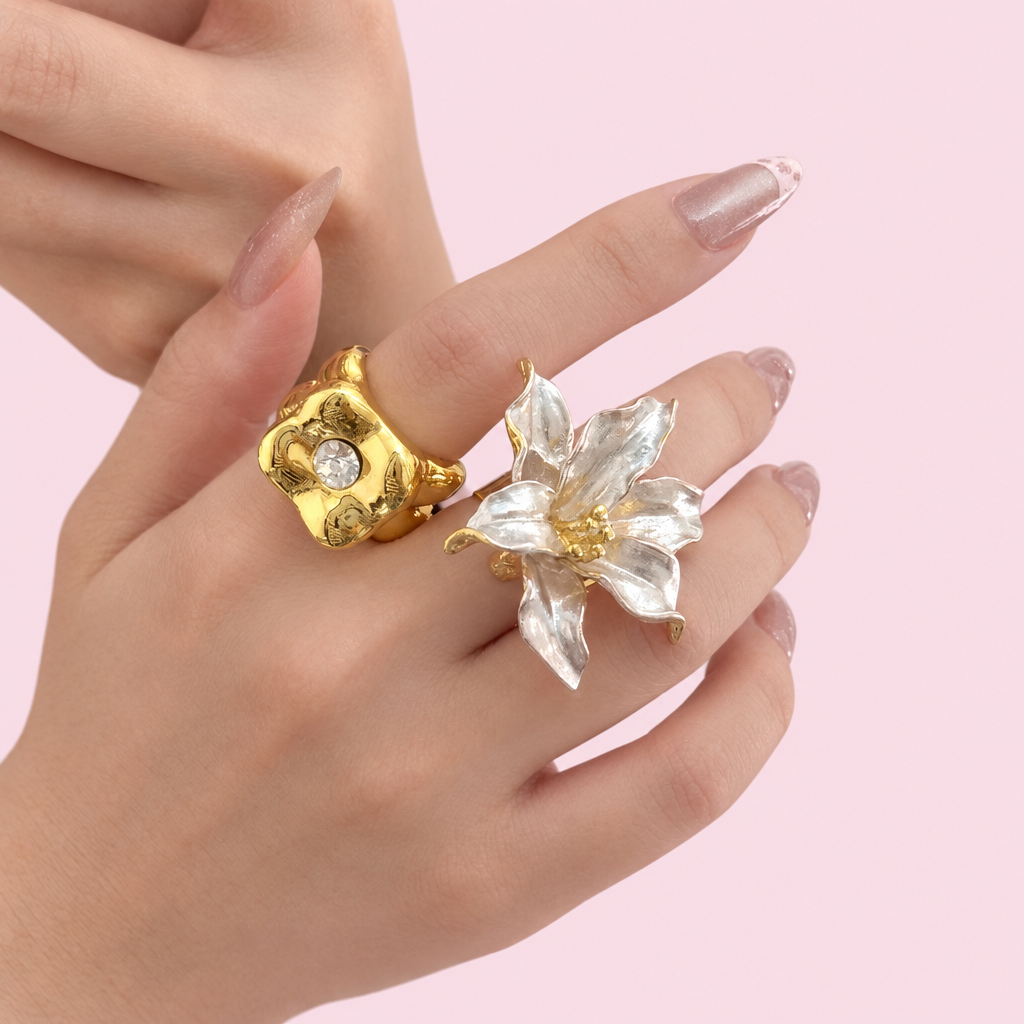 Surrealist ring on a light pink background