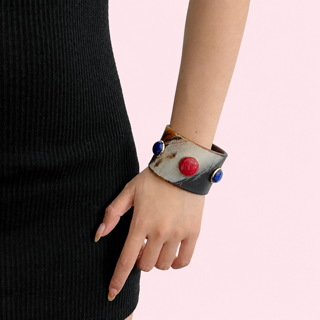 Natural Stone Wide Cuff Bracelet on a light pink background