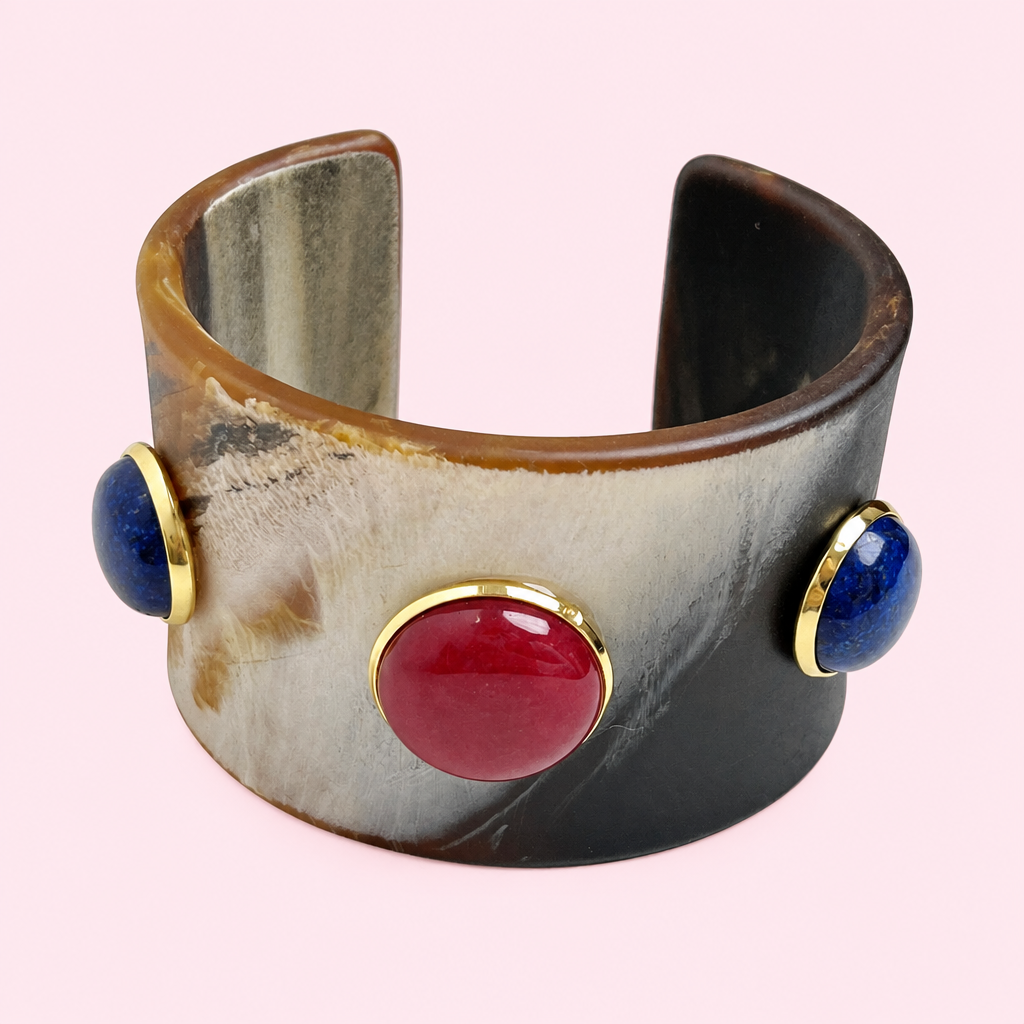 Natural Stone Wide Cuff Bracelet on a light pink background