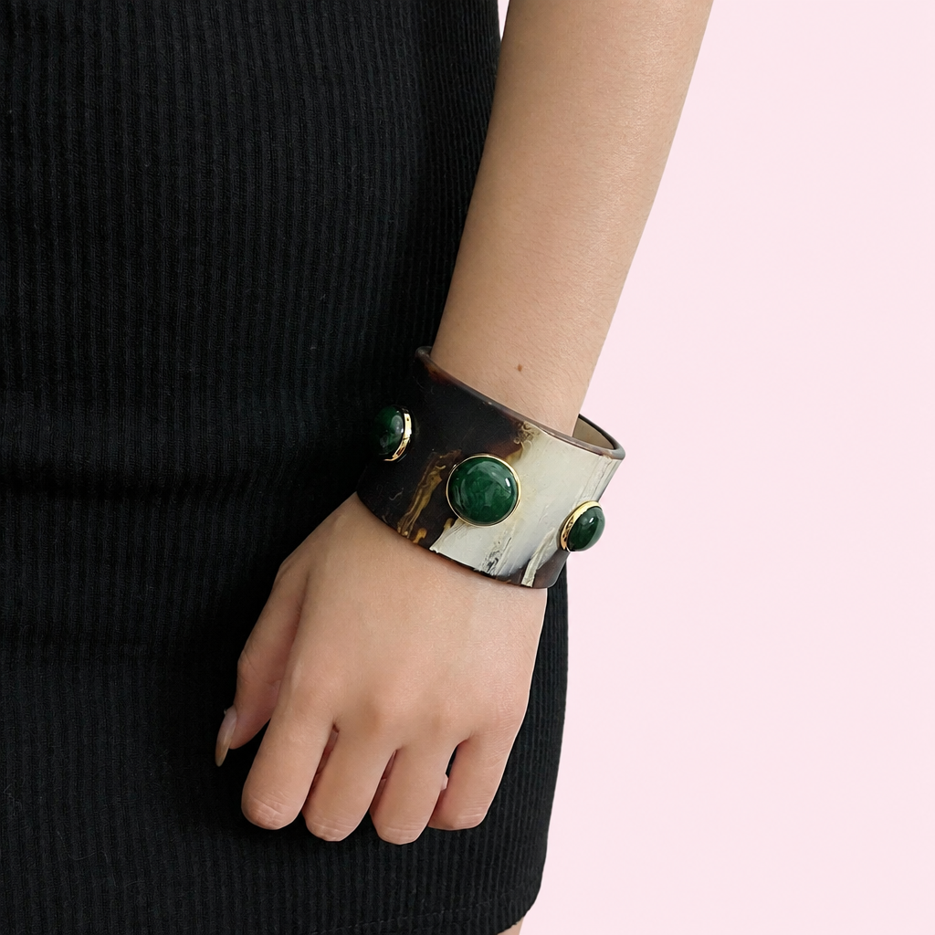 Natural Stone Wide Cuff Bracelet on a light pink background