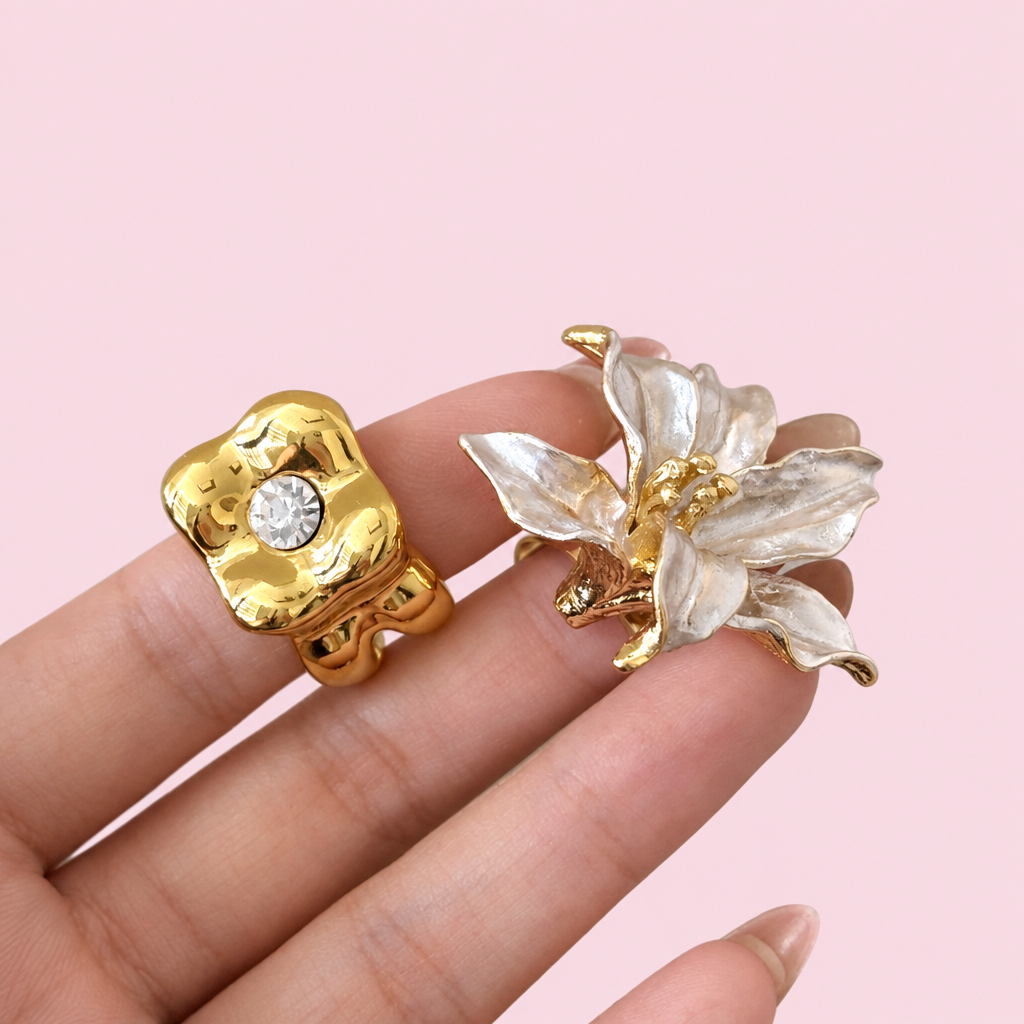 Surrealist ring on a light pink background